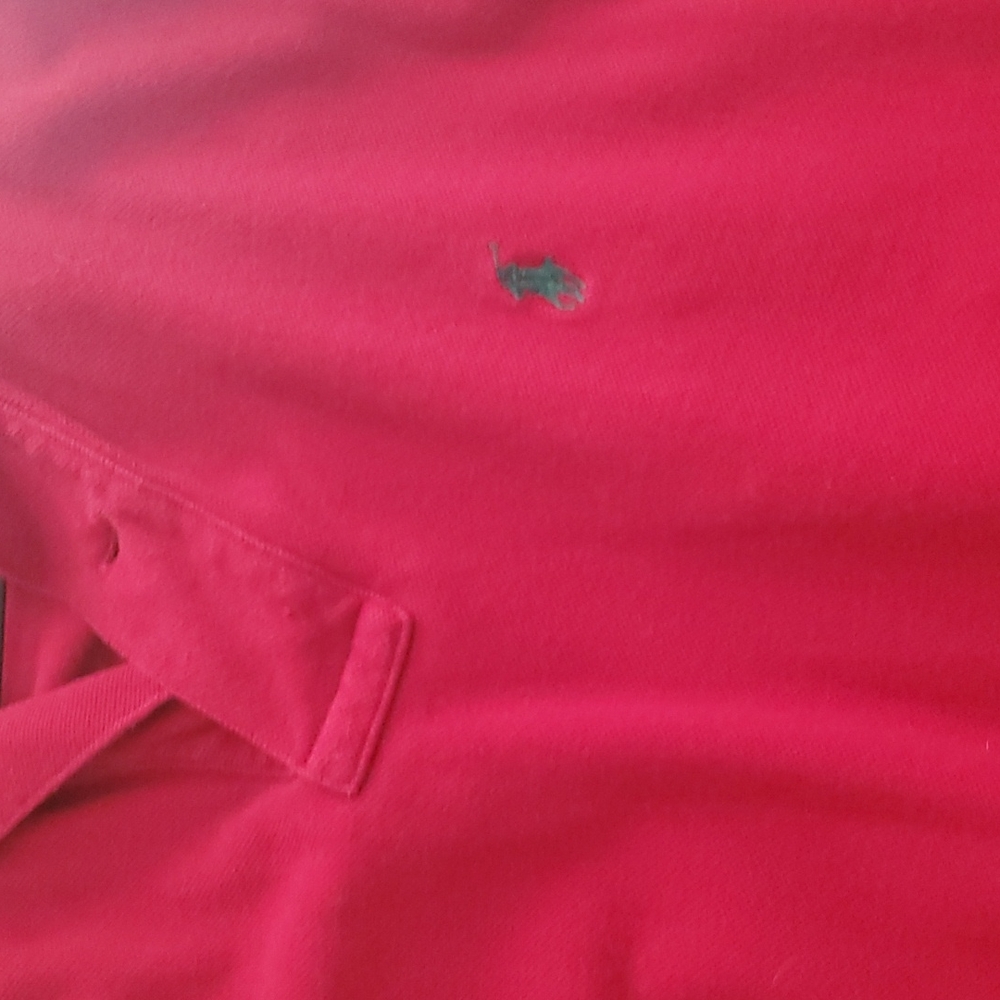 Polos 1/$14  2/$22 3/$30 All large except navy is medium